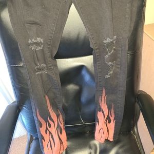 Rue 21 skinny ripped jeans with flames